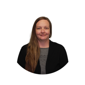 A woman wearing glasses and a black shirt is smiling