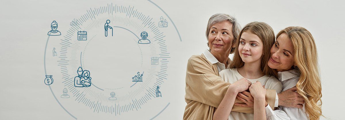 Three women are hugging each other in front of a clock.