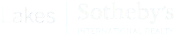 Faint white text on a very light background, barely visible.