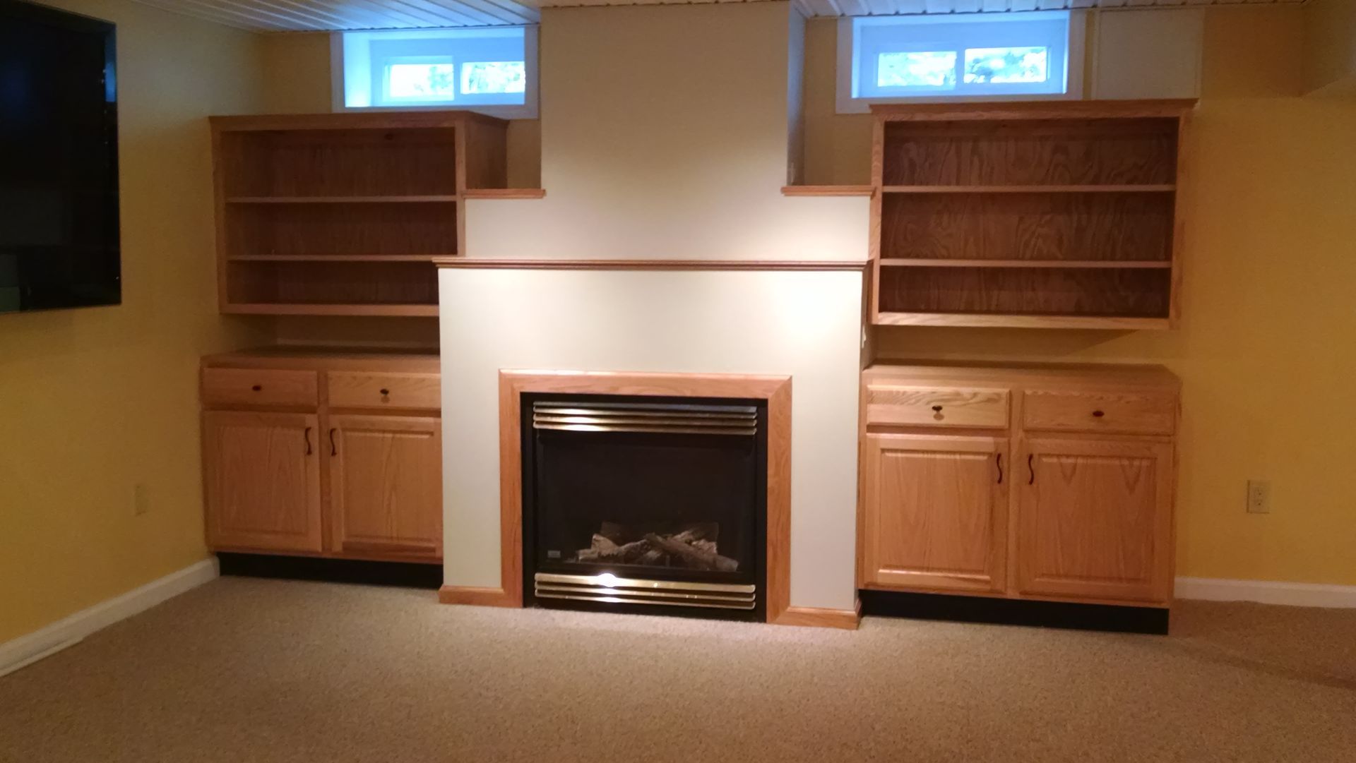 There is a fireplace in the middle of the room.