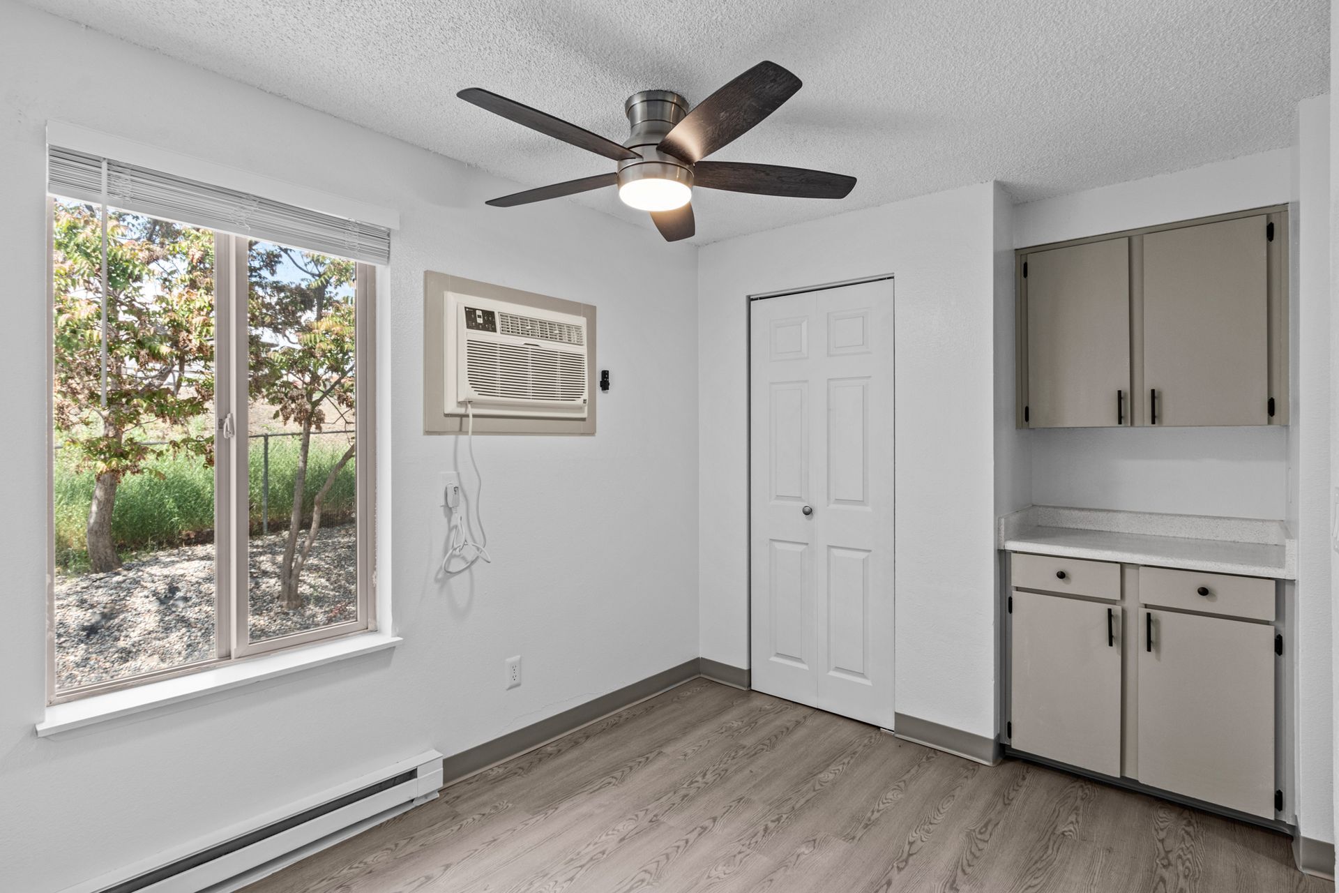 Dining Room with Ceiling Fan and Pantry