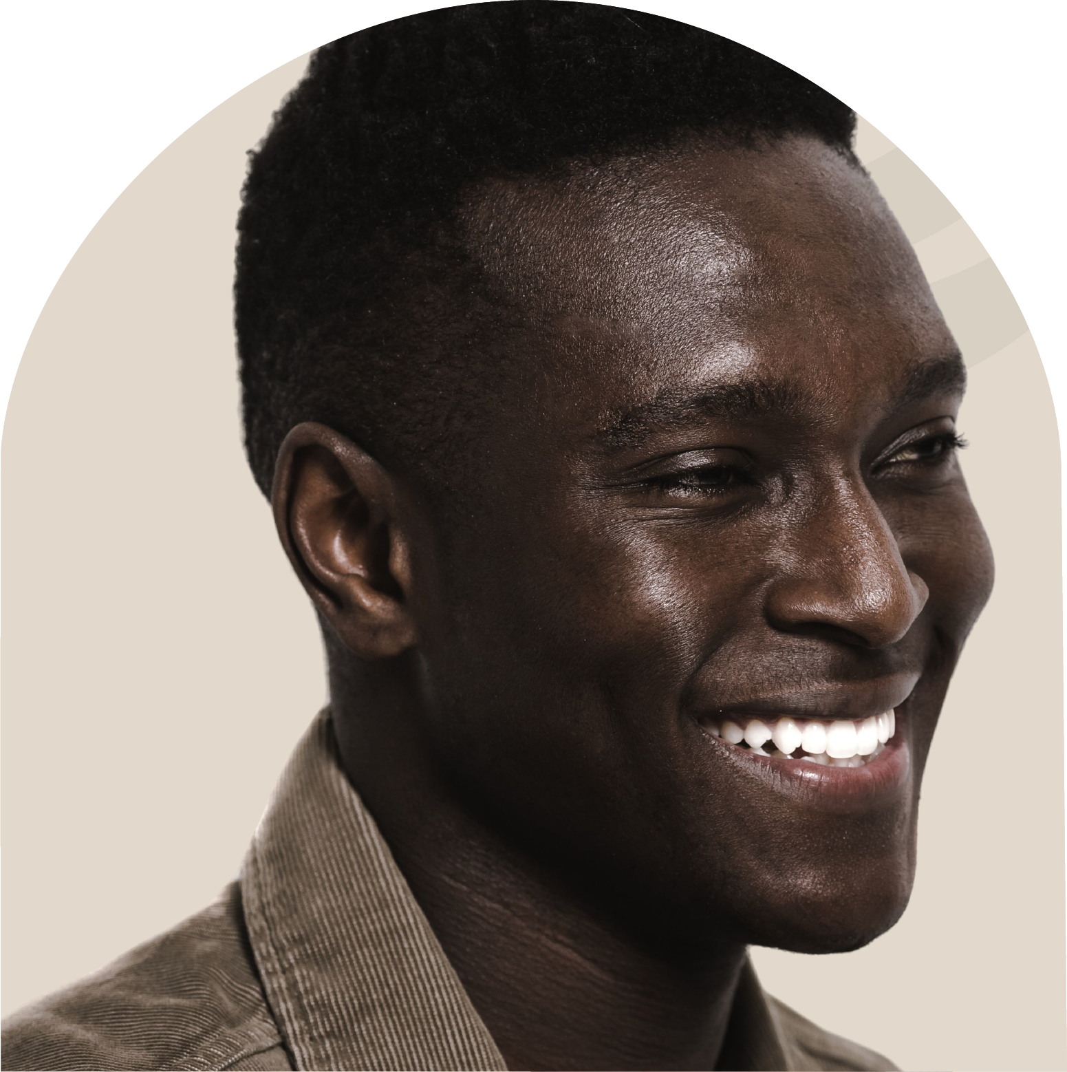 A close up of a man 's face with a smile on his face