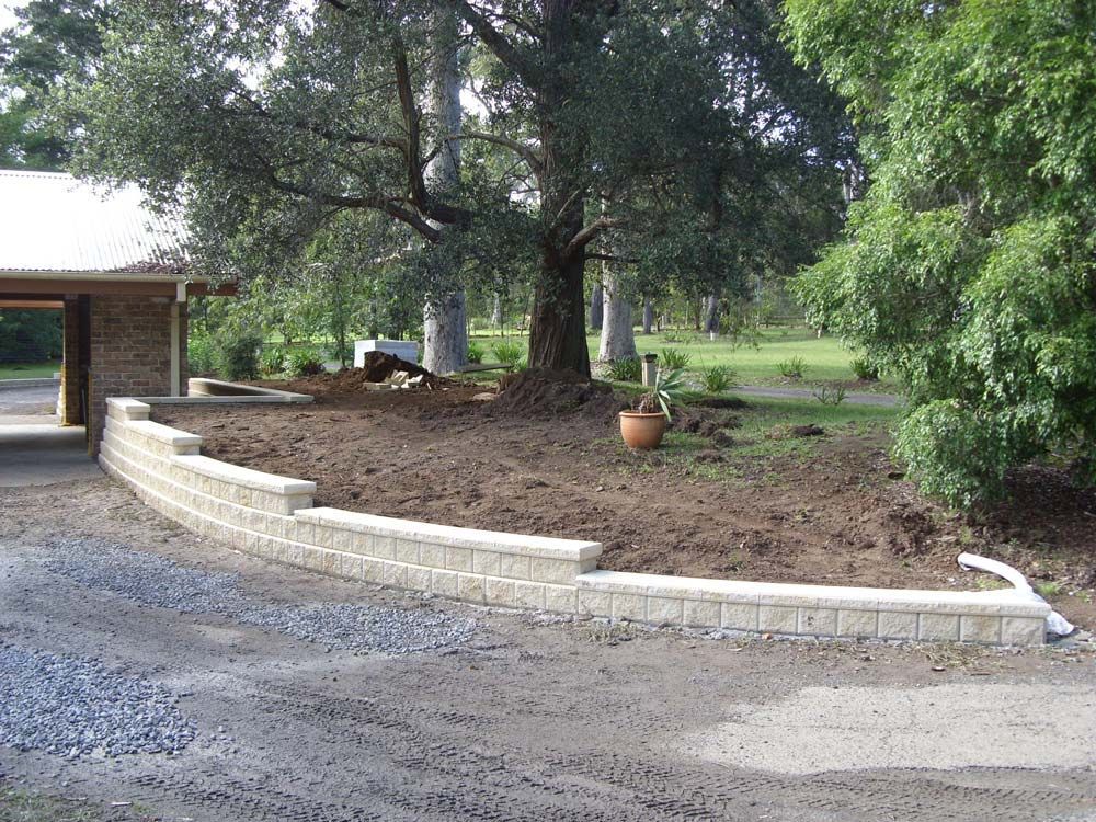 Low Wall White Wall and Landscaping — Wallaroo Landscapes In Nowra, NSW