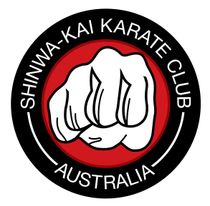 Shinwa-Kai Karate Club Australia logo with a white fist on a red and black circular emblem