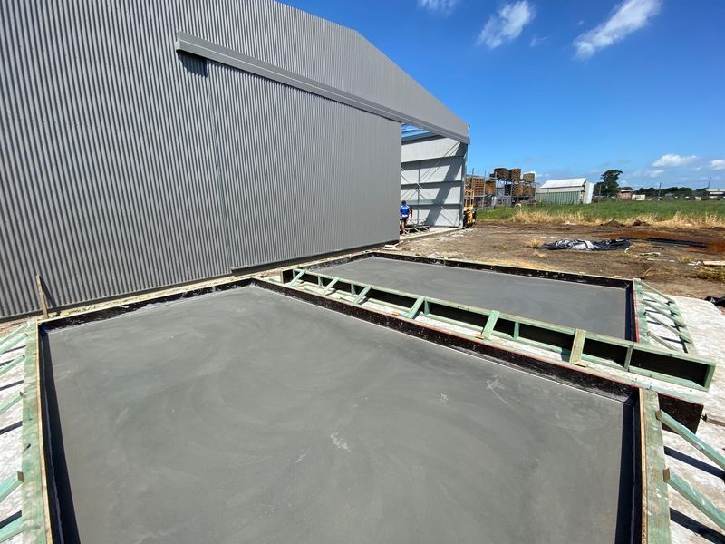 A large timber frame with concrete slab in front — Wal's Concreting Service Pty Ltd in Ballina, NSW