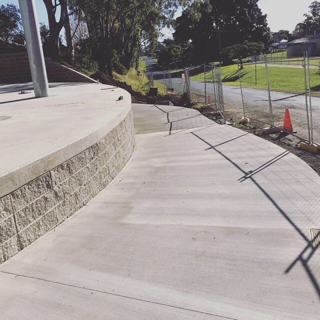 Concrete Walkway and Retaining Wall at Park Construction Site — Wal's Concreting Service Pty Ltd in North Casino, NSW