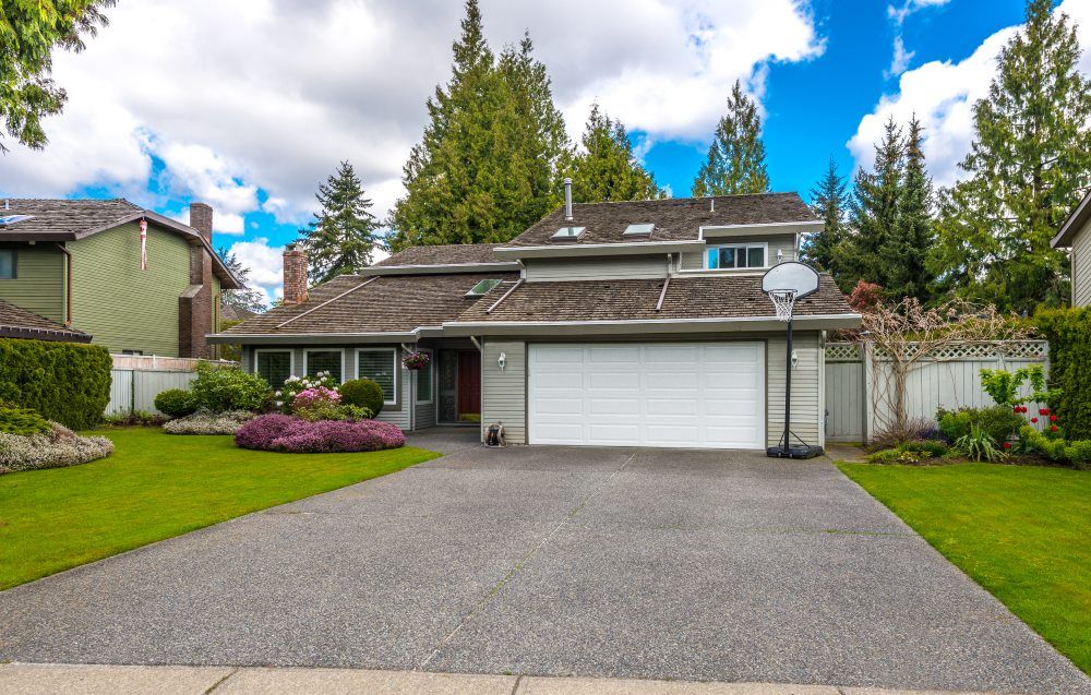 A House With A Basketball Hoop In Front Of It — Tamworth Strata Management Services in Tamworth, NSW