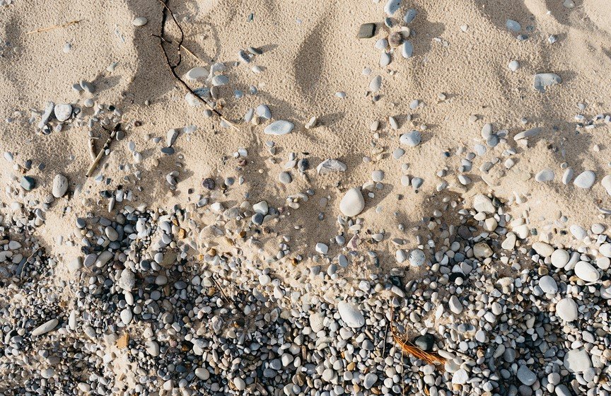 white sand with pebbles