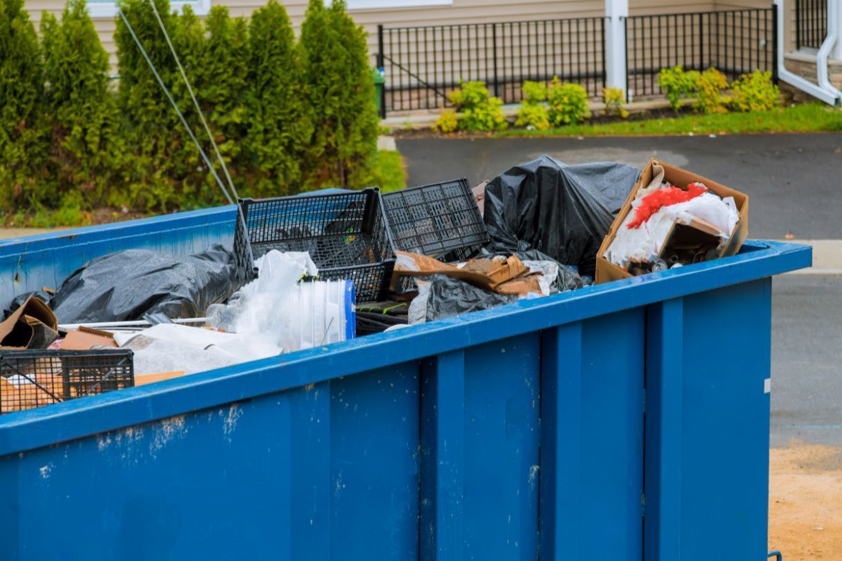 Waste in Dumpster