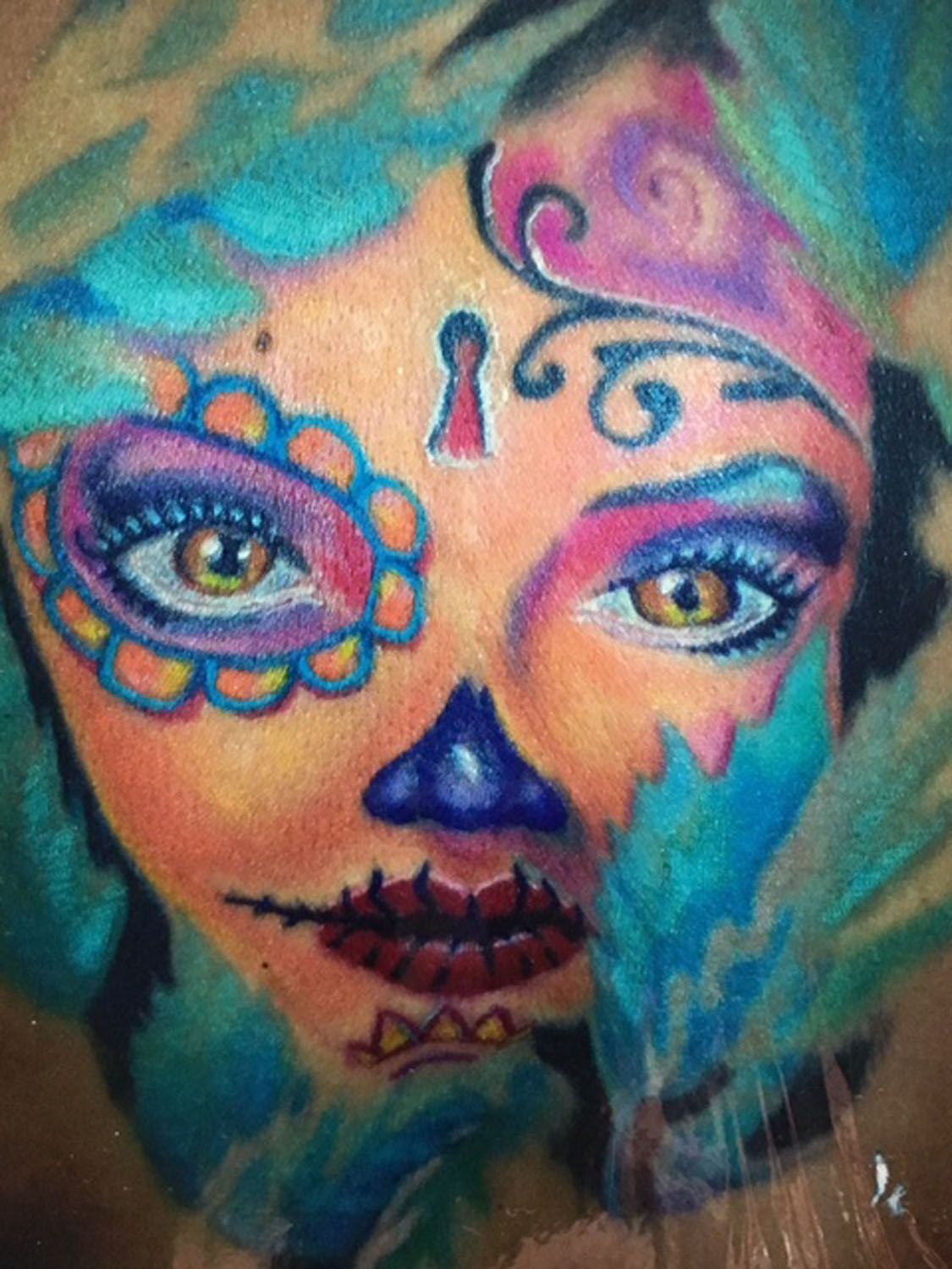 A colorful face tattoo