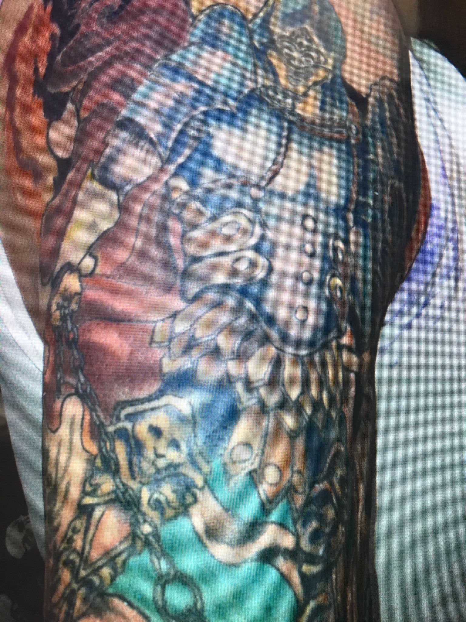 A close up of a tattoo on a person 's arm.