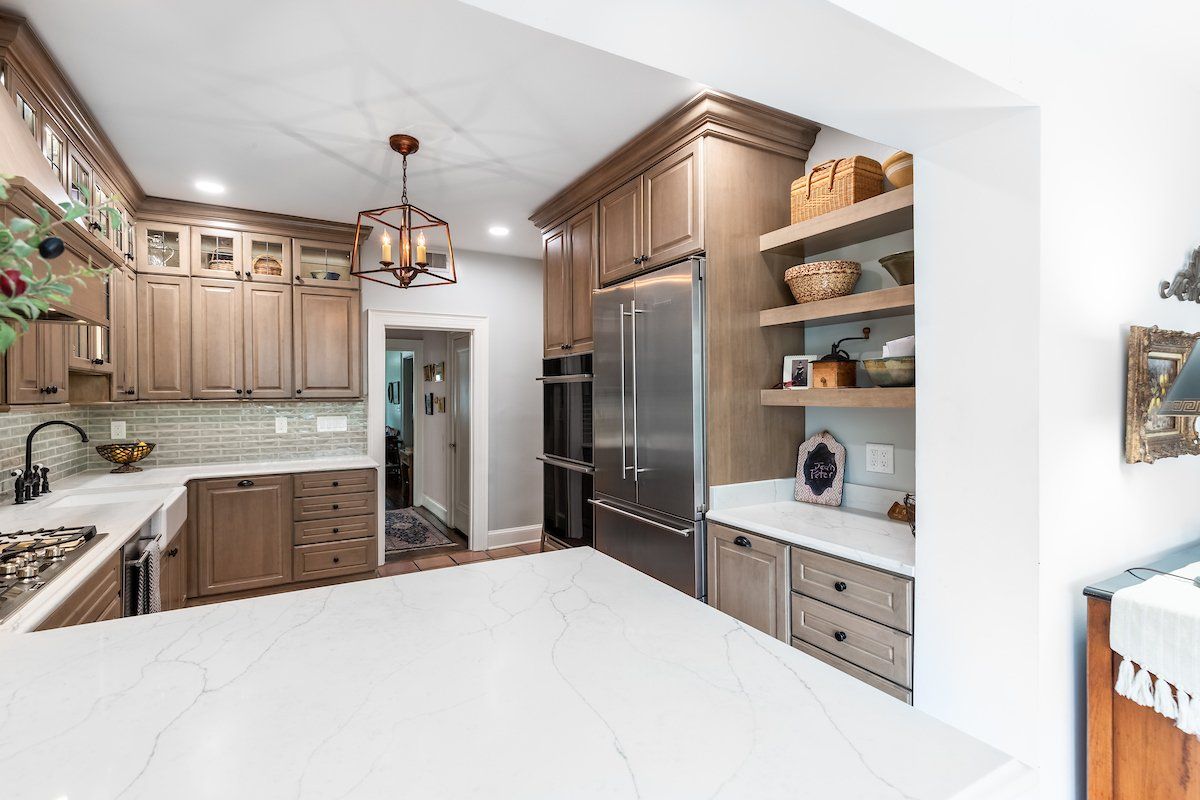 Calacatta Prado 3CM Q Quartz Countertops with Ogee Edge; Dura Supreme Cabinets