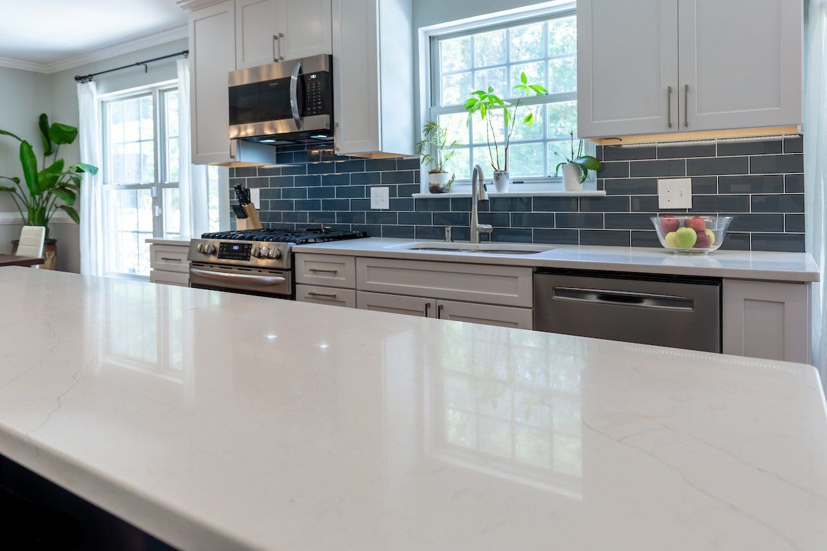 Painted Linen Waypoint Cabinets , Calacatta Alto Q Quartz Countertops