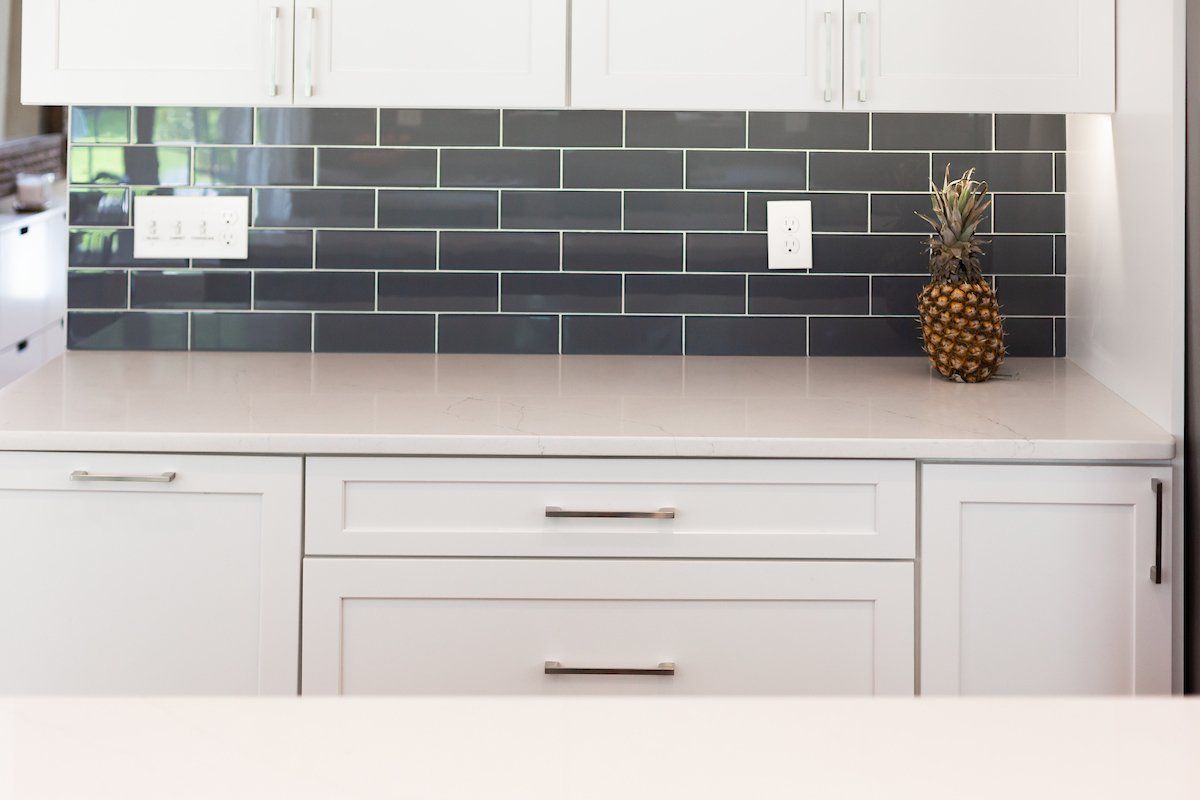 Painted Linen Waypoint Cabinets , Calacatta Alto Q Quartz Countertops