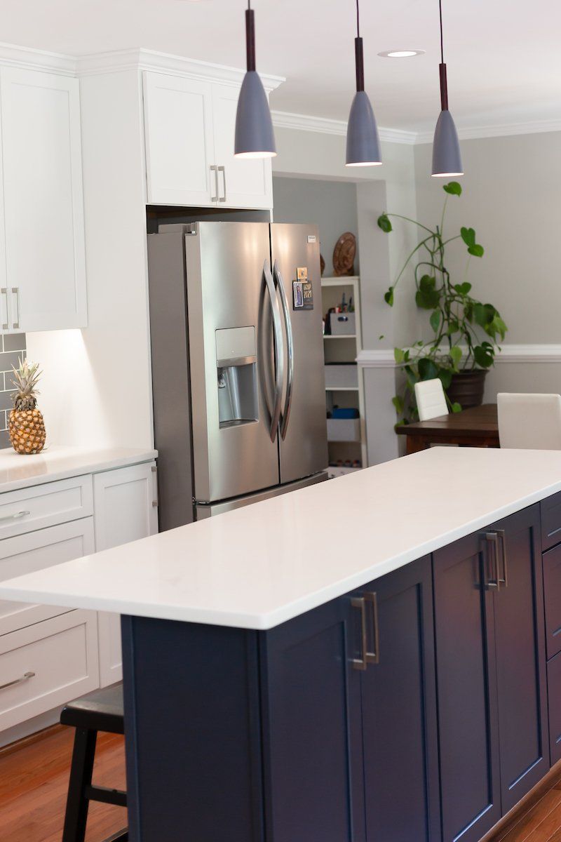 Painted Navy Waypoint Island , Calacatta Alto Q Quartz Countertops