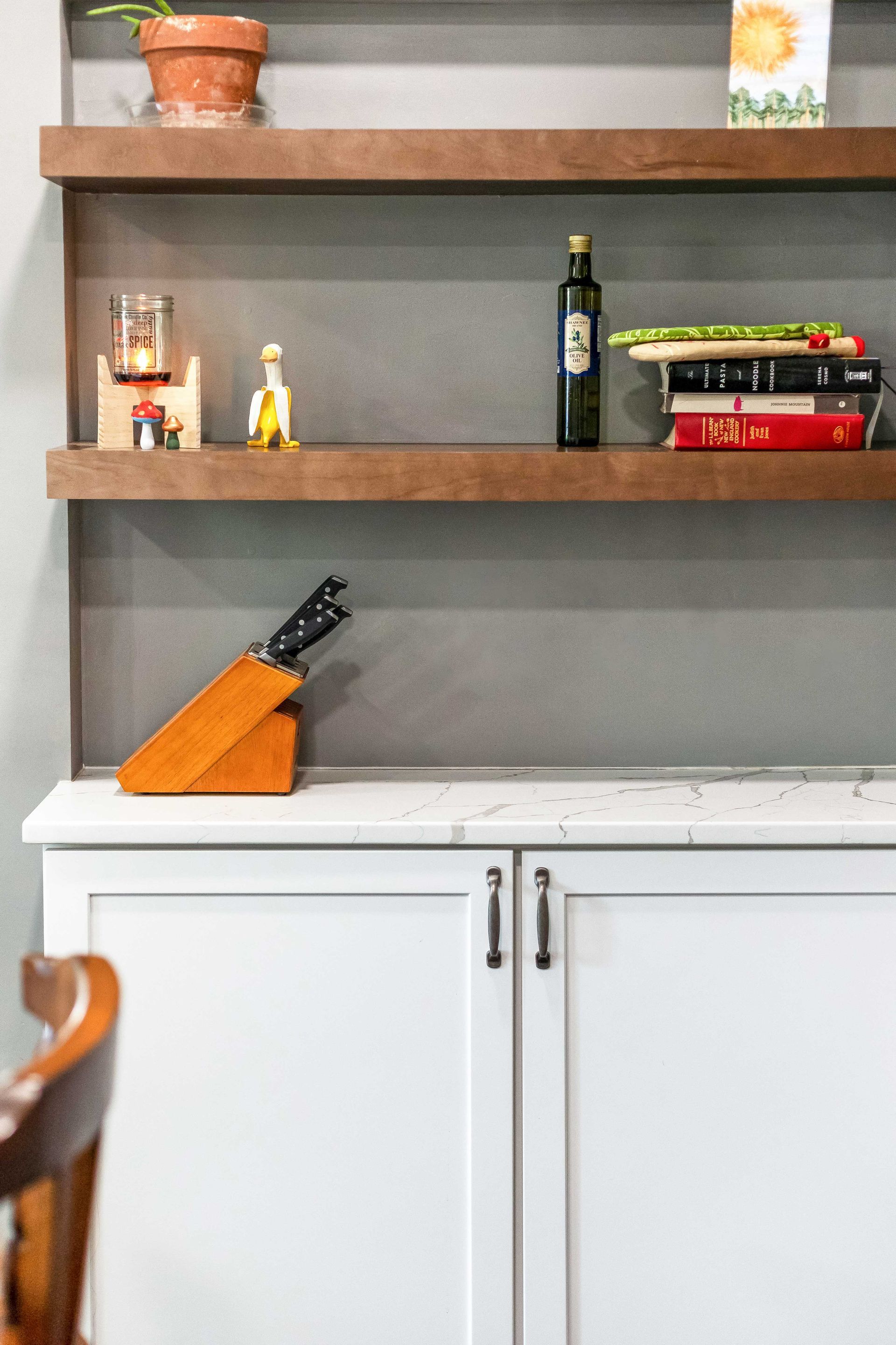 Waypoint Painted Linen Cabinet and Maple Truffle Floating Shelves with Calacatta Laza Q Quartz Countertops