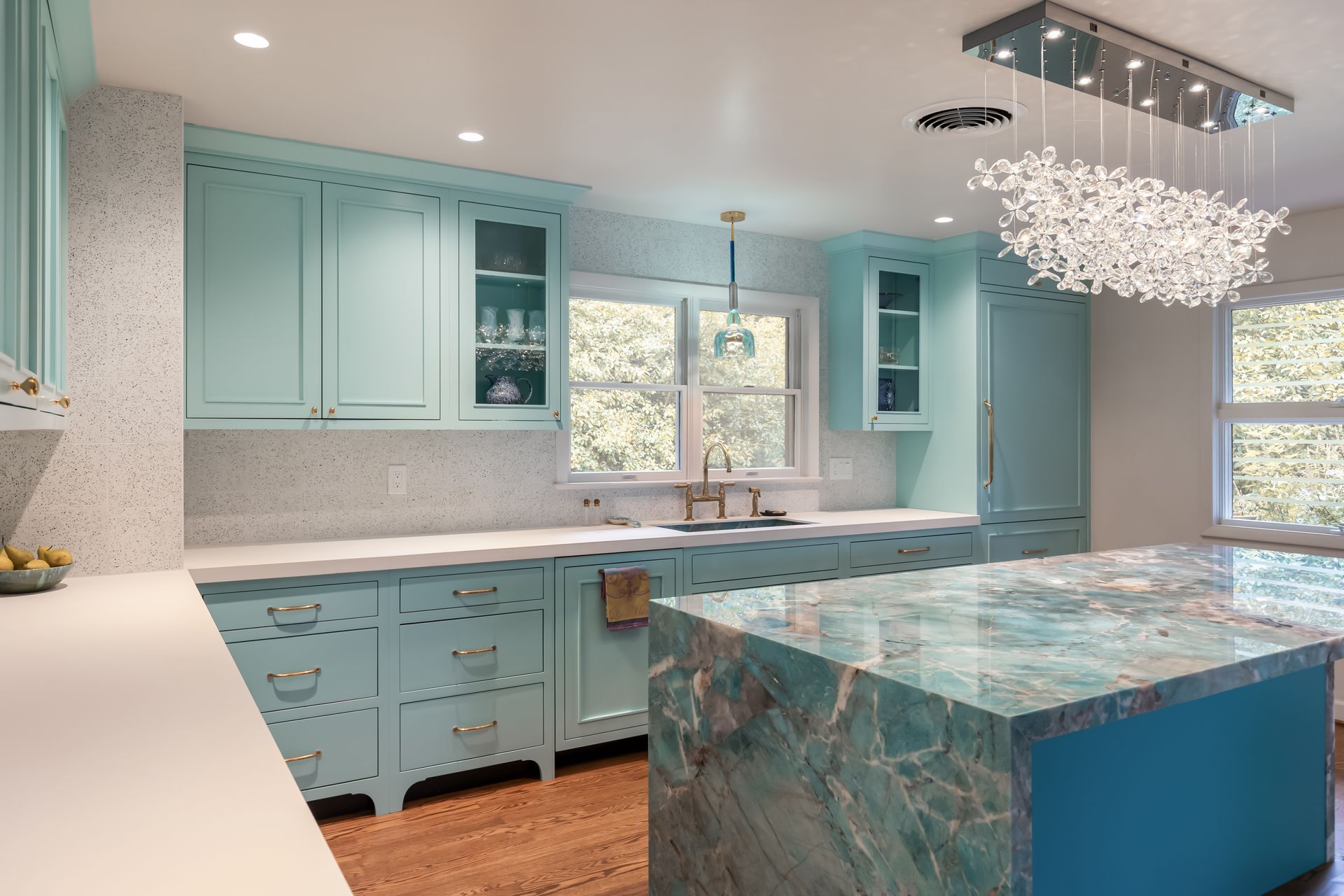 Amazonite Polished Quartzite Island with Island Cabinet custom color matched to Benjamin Moore Poseidon by Herco 
NeoLith Arctic White Satin Perimeter Countertops with Perimeter Cabinets custom color matched to Benjamin Moore Ocean Frost by Herco