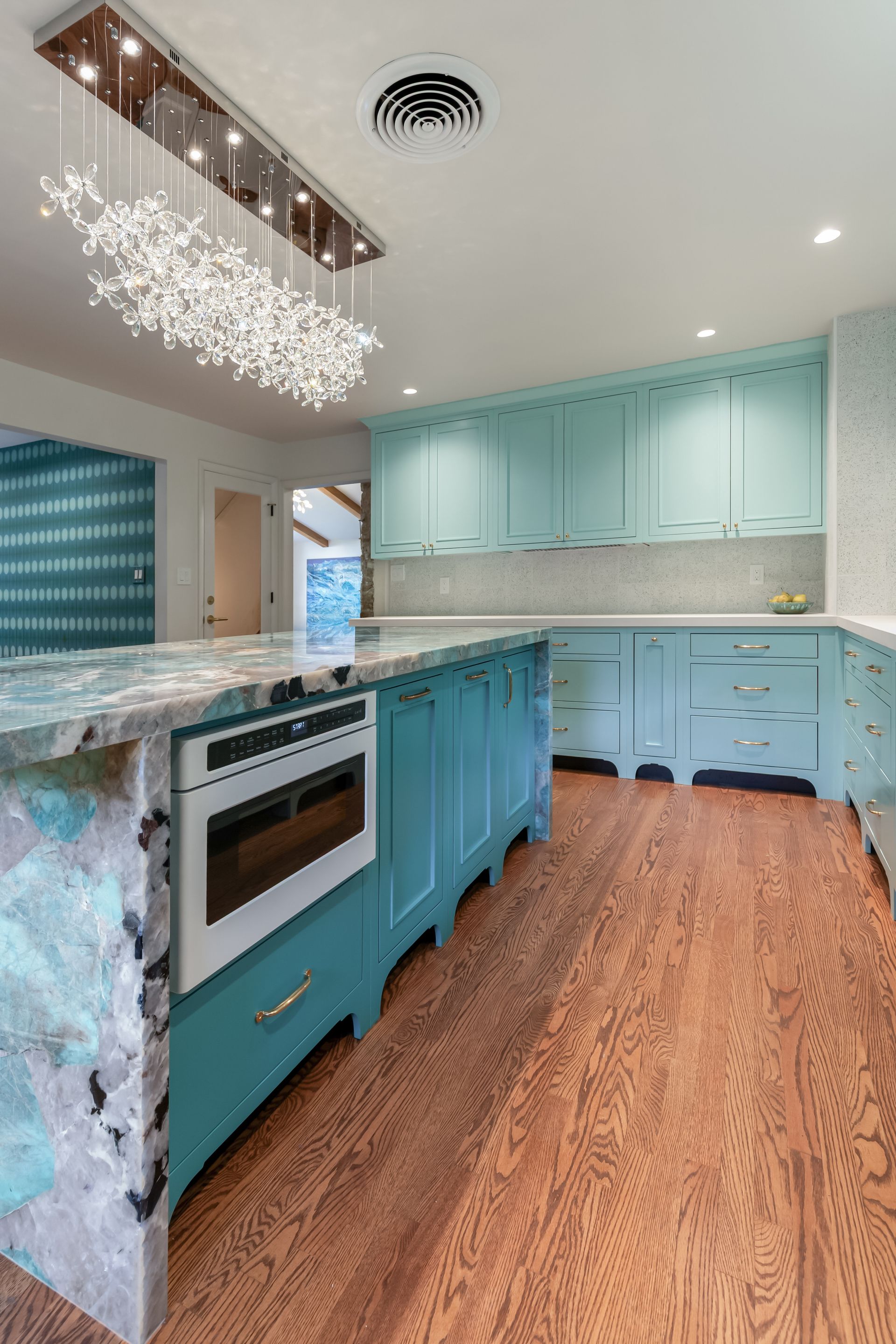 Perimeter Cabinets custom color matched to Benjamin Moore Ocean Frost by Kiln 
Island Cabinet custom color matched to Benjamin Moore Poseidon by Kiln