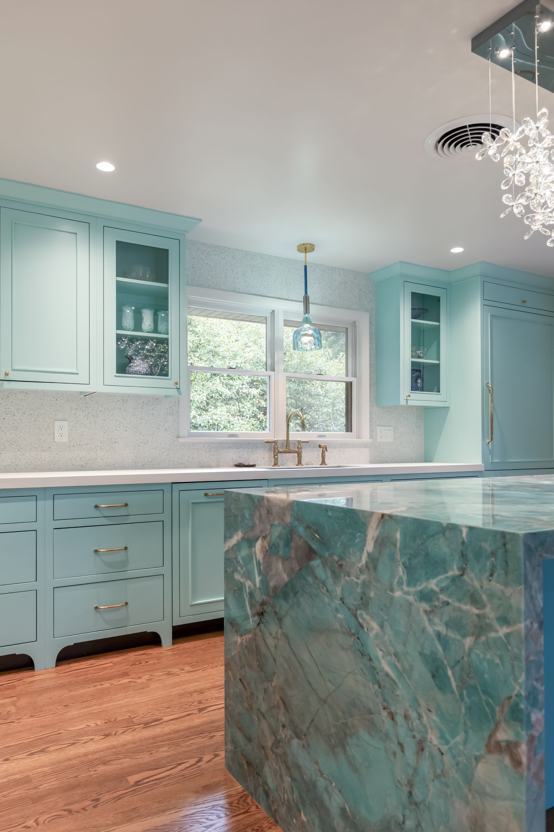 Amazonite Polished Quartzite Island with perimeter cabinets custom color matched to Benjamin Moore Ocean Frost by Herco