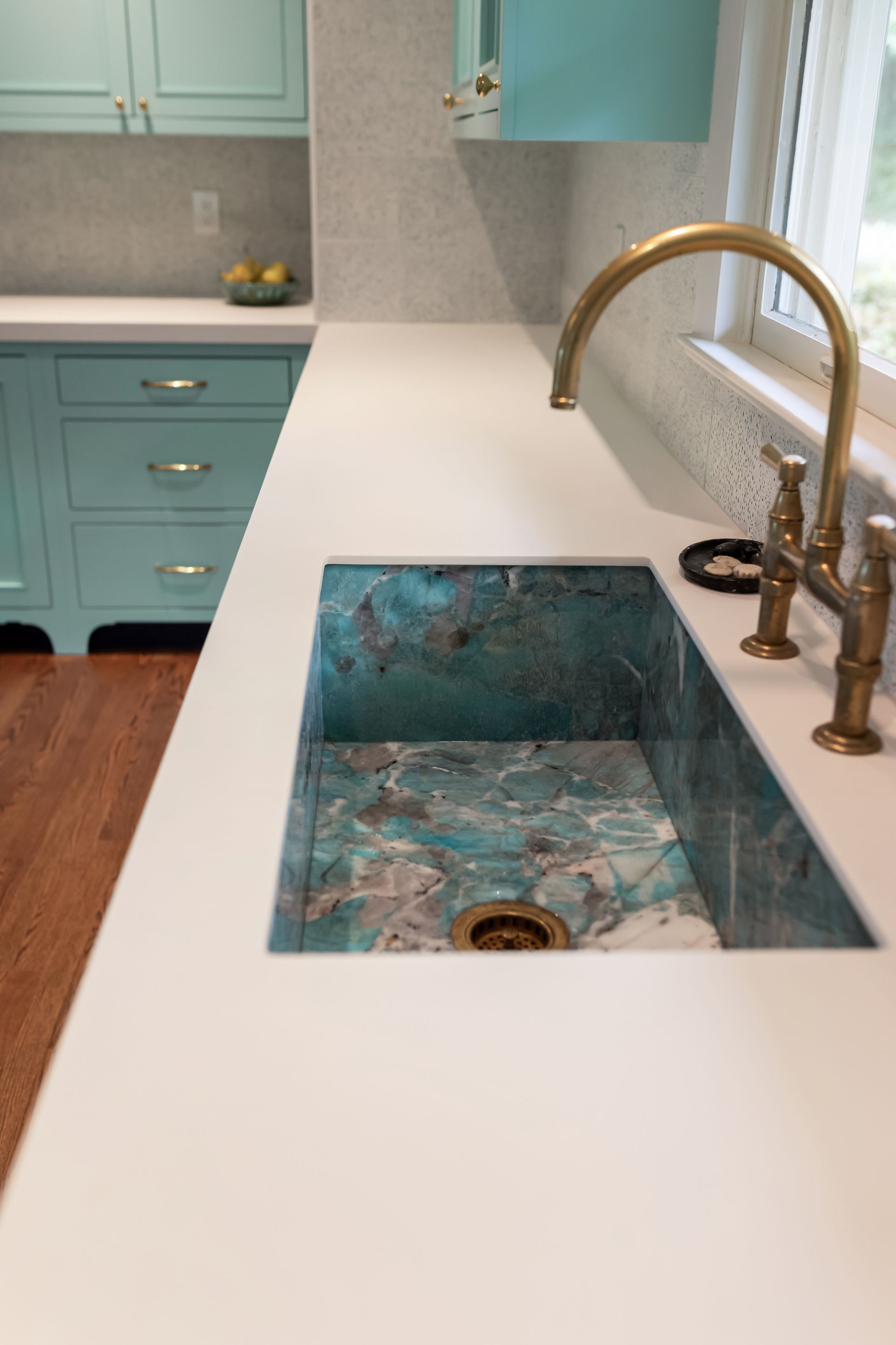 NeoLith Arctic White Satin Perimeter Countertops with Amazonite Polished Quartzite Sink
