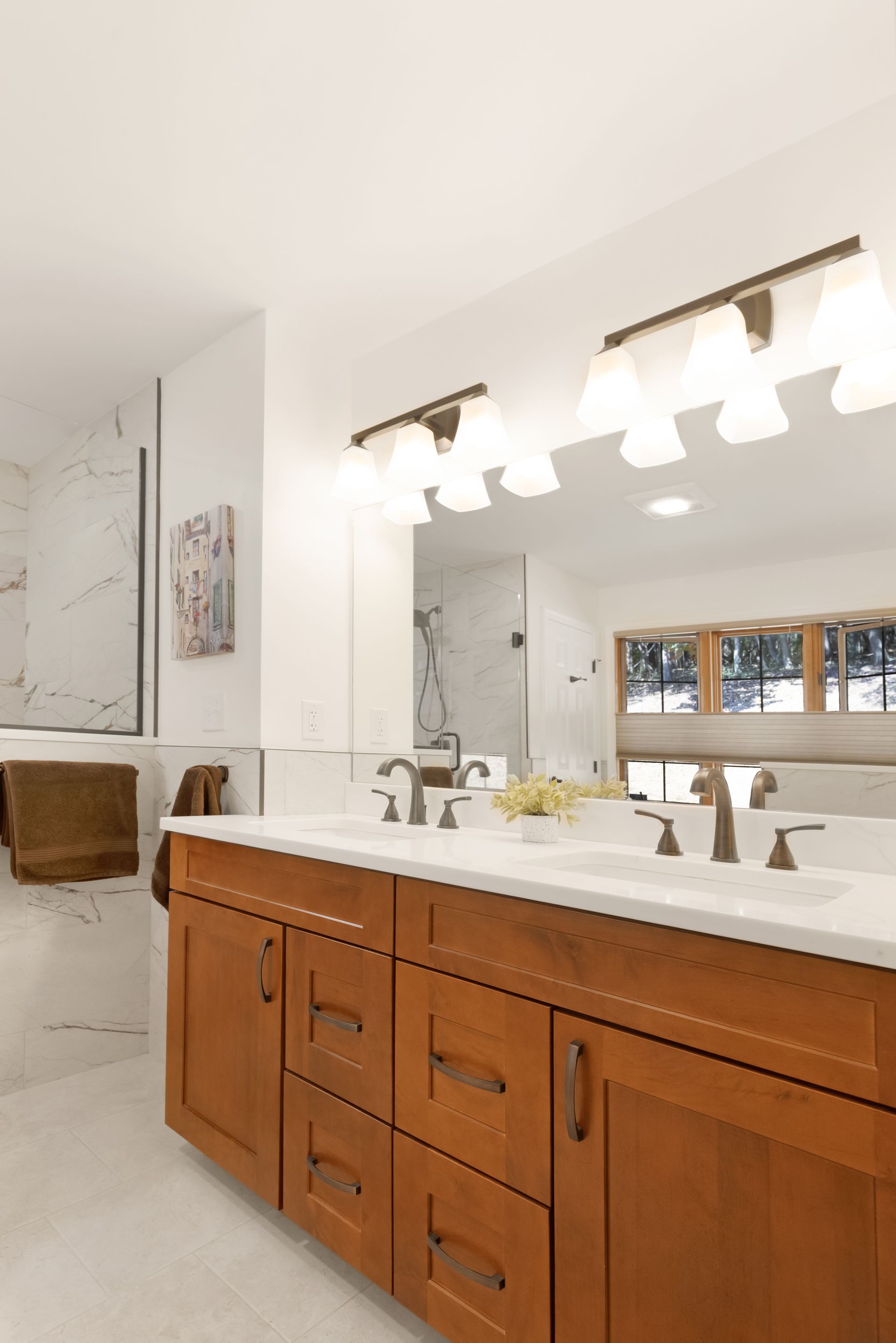 Waypoint Maple Cognac Cabinetry with Calacatta Mirragio Gold Vanity Top