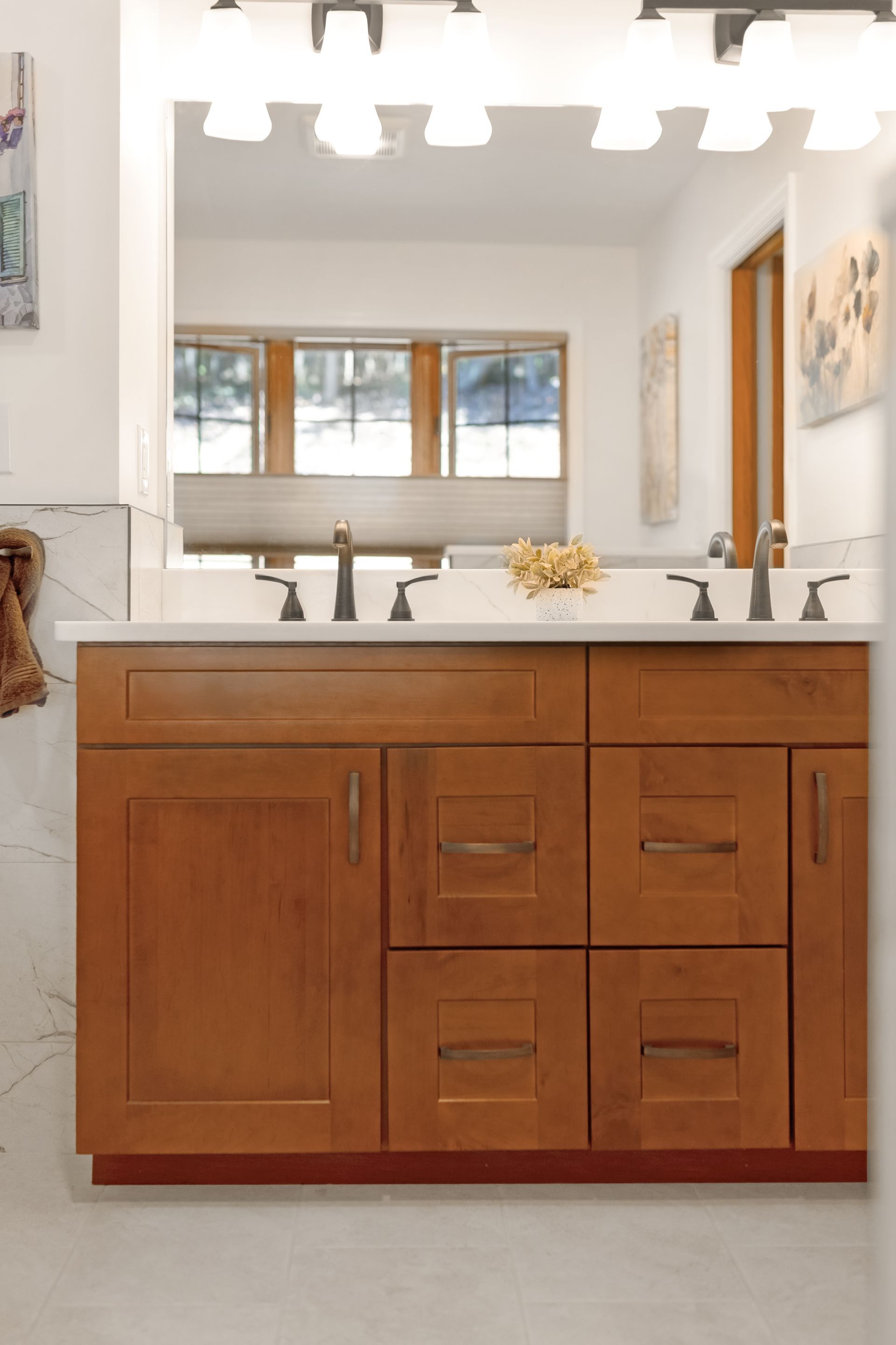 Waypoint Maple Cognac Cabinetry with Calacatta Mirragio Gold Vanity Top