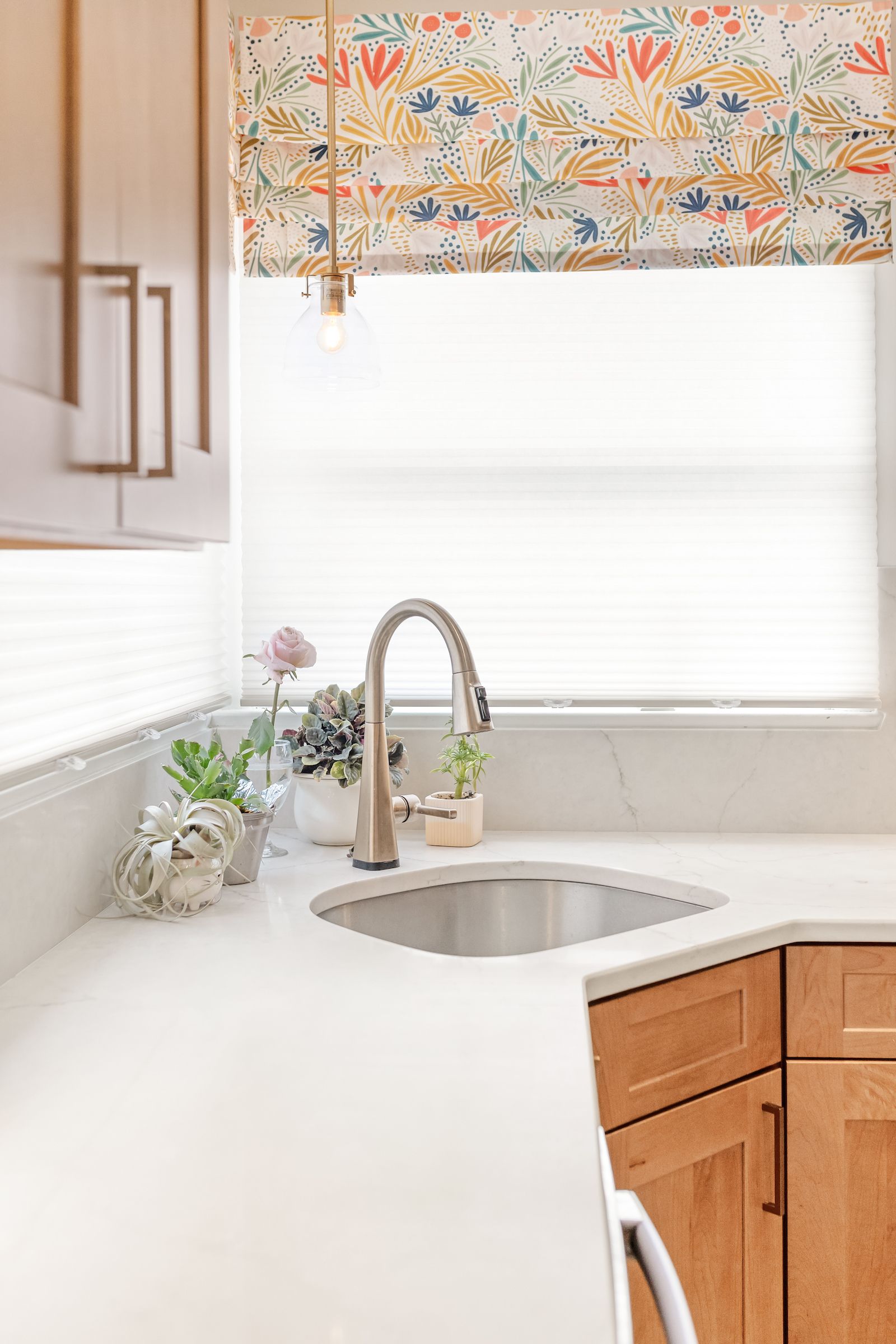 Calacatta Valentin Q Quartz and Waypoint Maple Rye Cabinets