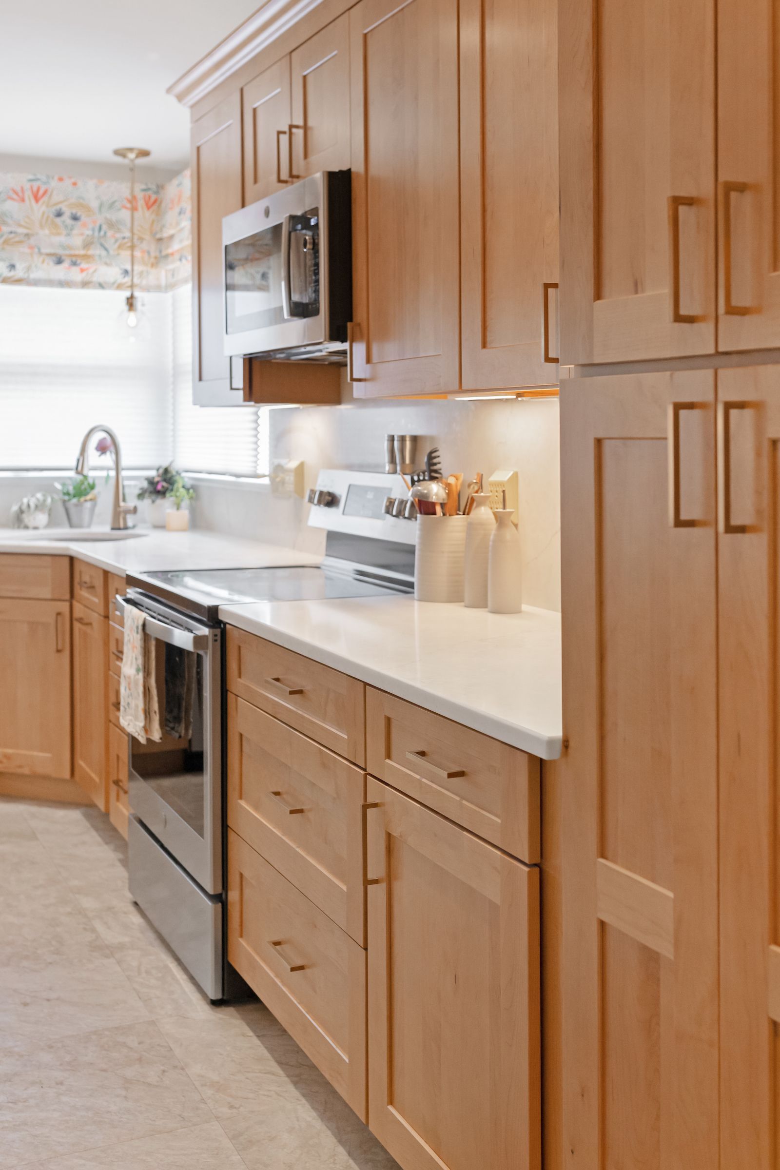 Calacatta Valentin Q Quartz and Waypoint Maple Rye Cabinets