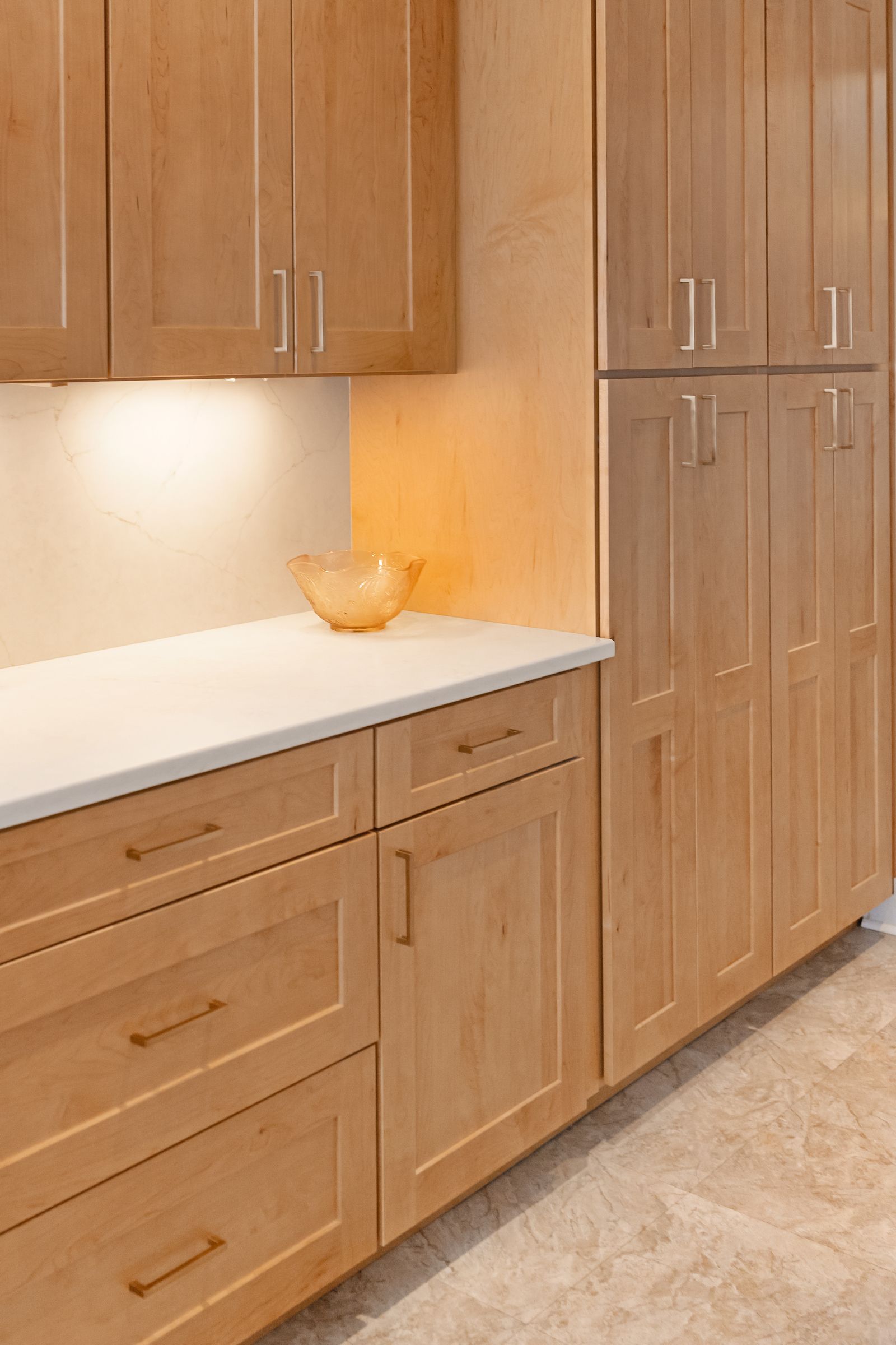 Calacatta Valentin Q Quartz and Waypoint Maple Rye Cabinets