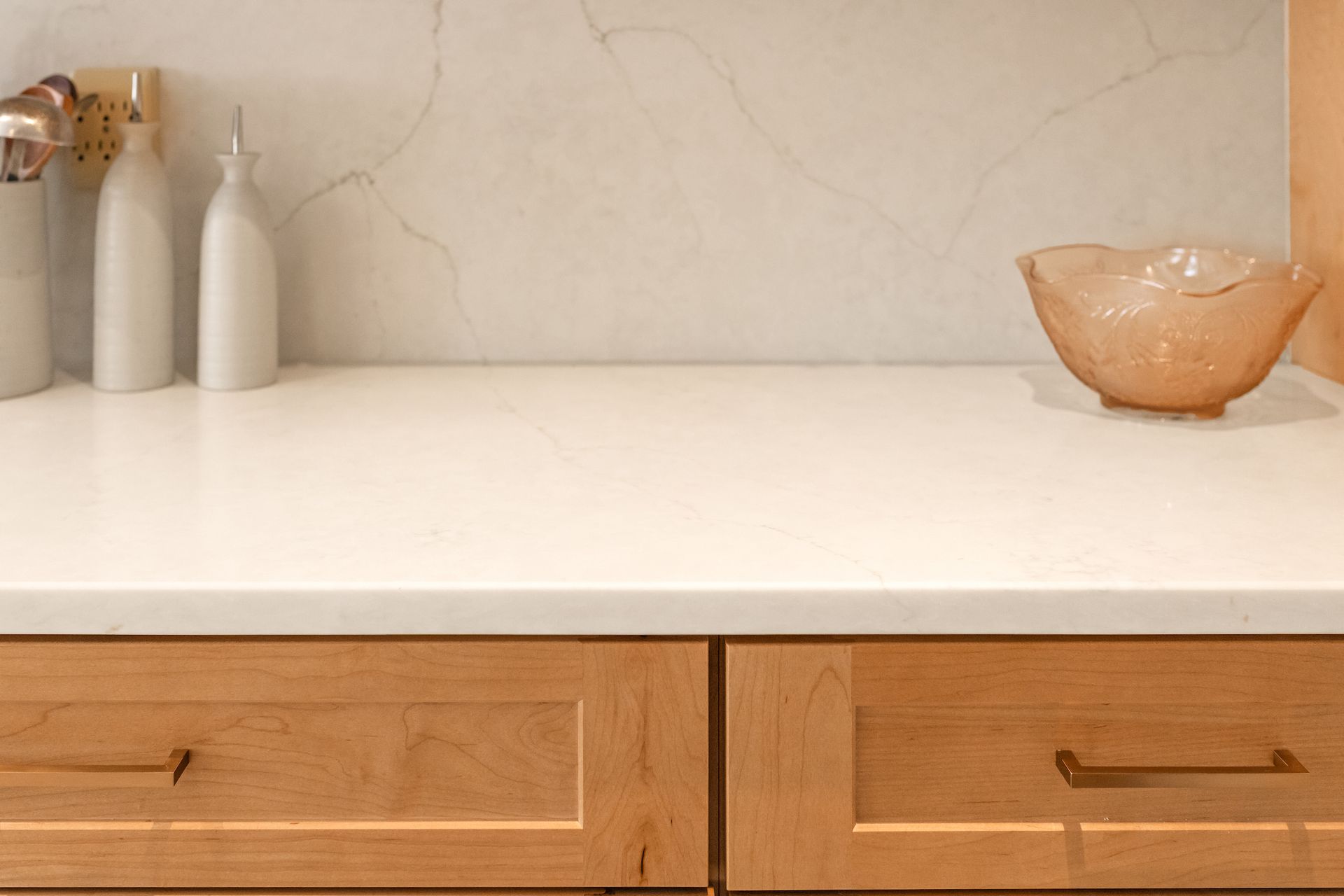 Calacatta Valentin Q Quartz and Waypoint Maple Rye Cabinets