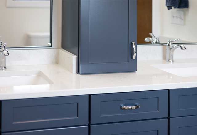 Waypoint Painted Navy Cabinets and Mara Blanca Q Quartz Countertops