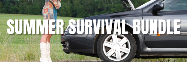 Stranded driver on the side of the road in front of an open car hood