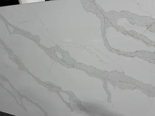 White countertop with gray veining.