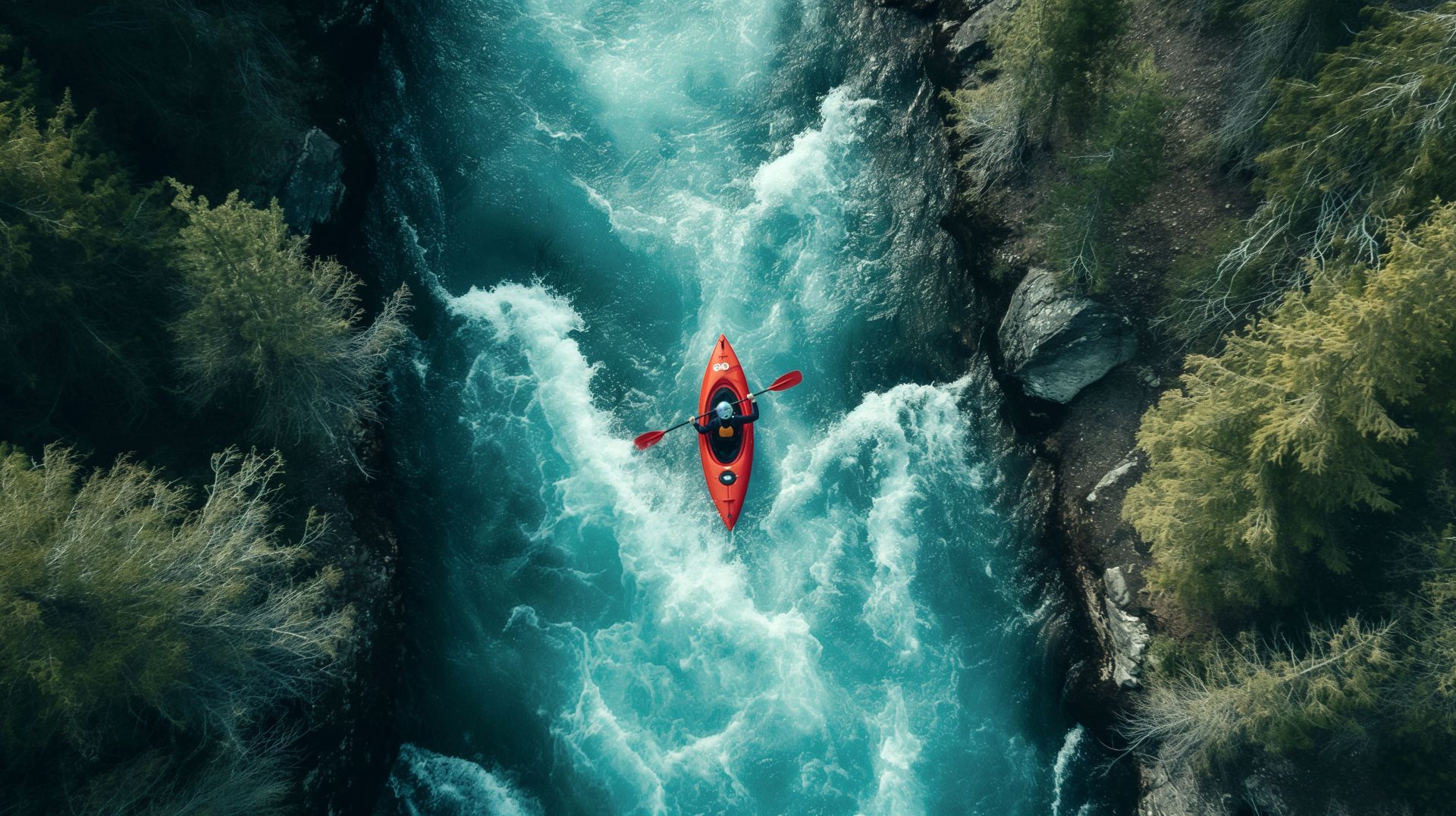 kayaker paddling down diver