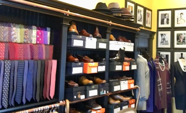 A store filled with lots of shoes and ties