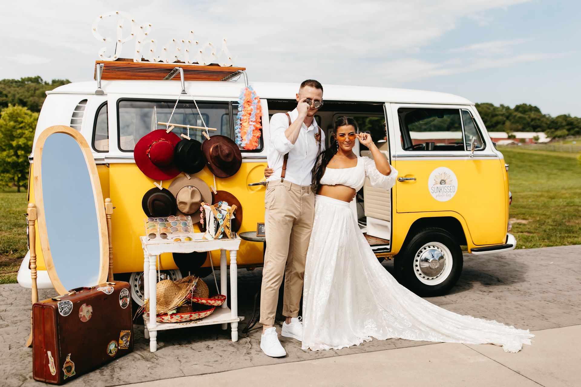 Chattanooga Photo Booth Rental for weddings. Bride and Groom take photos with a yellow VW photo bus 