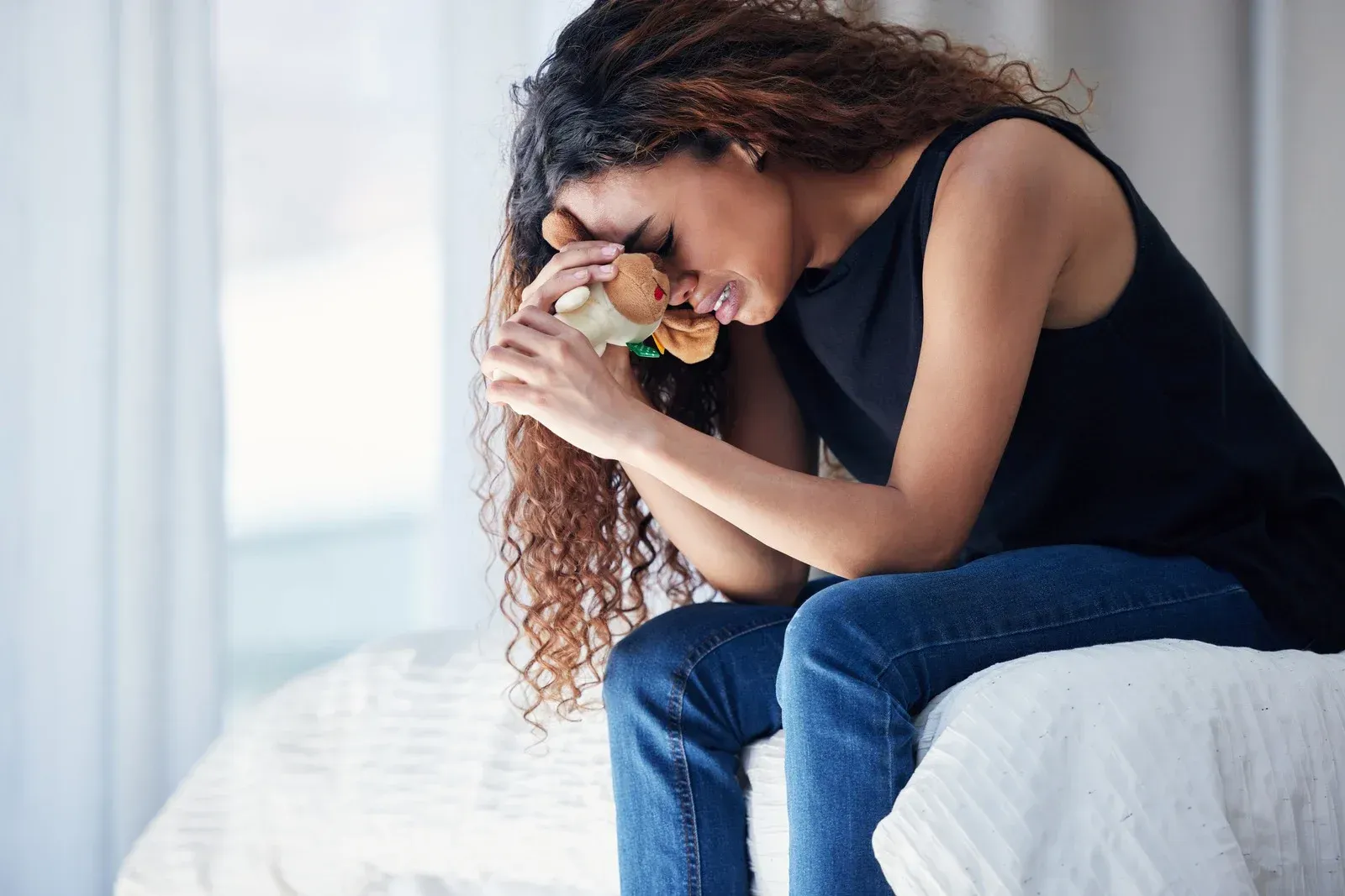 woman crying due to trauma