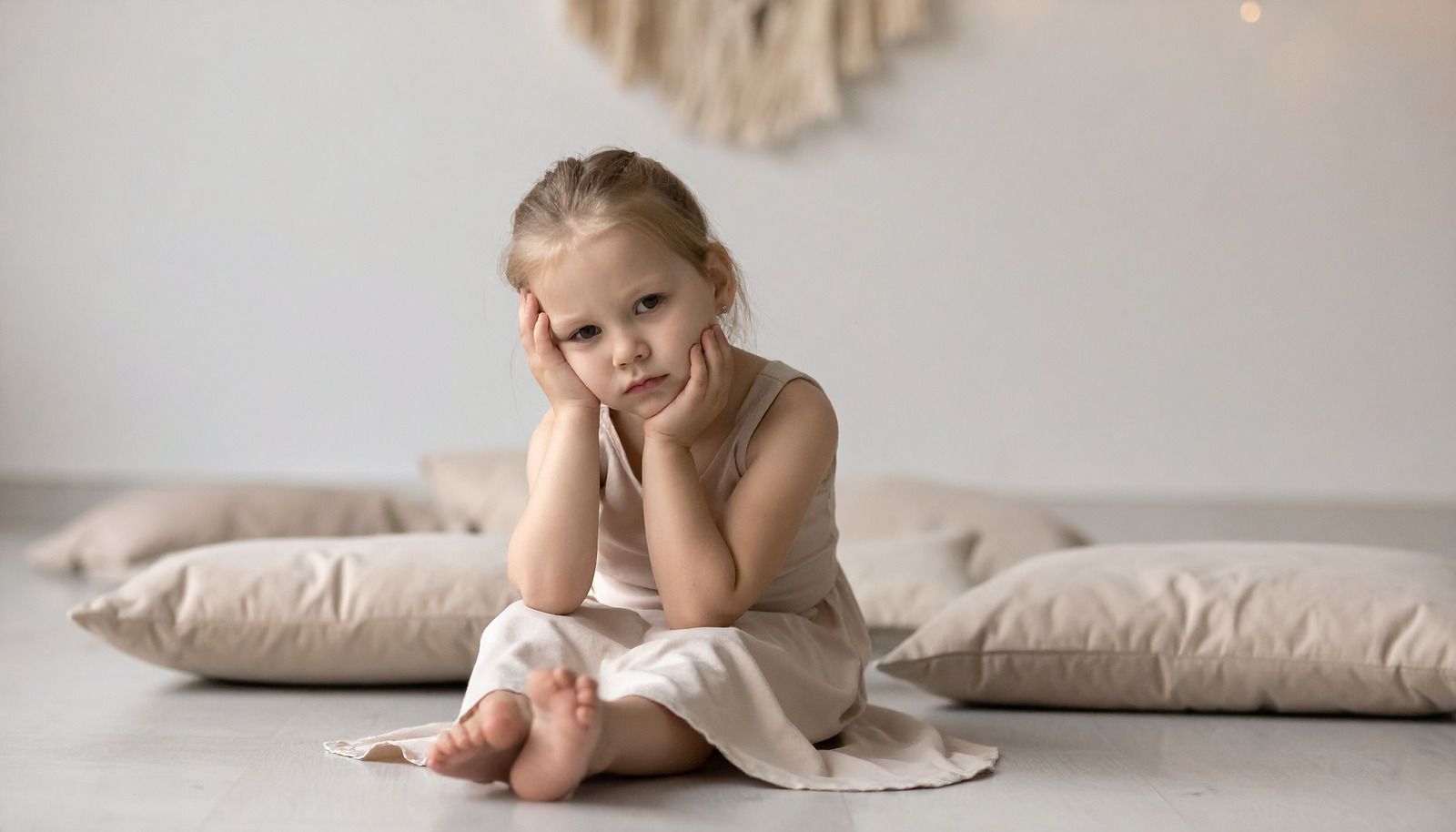 sad girl sitting on the floor