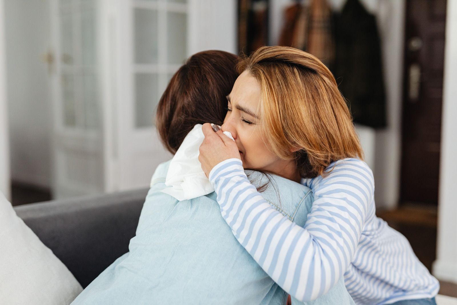 Sad woman during grief therapy