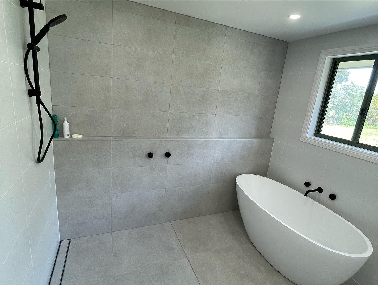 White Bath Tub — Bathroom Design in Wollongong