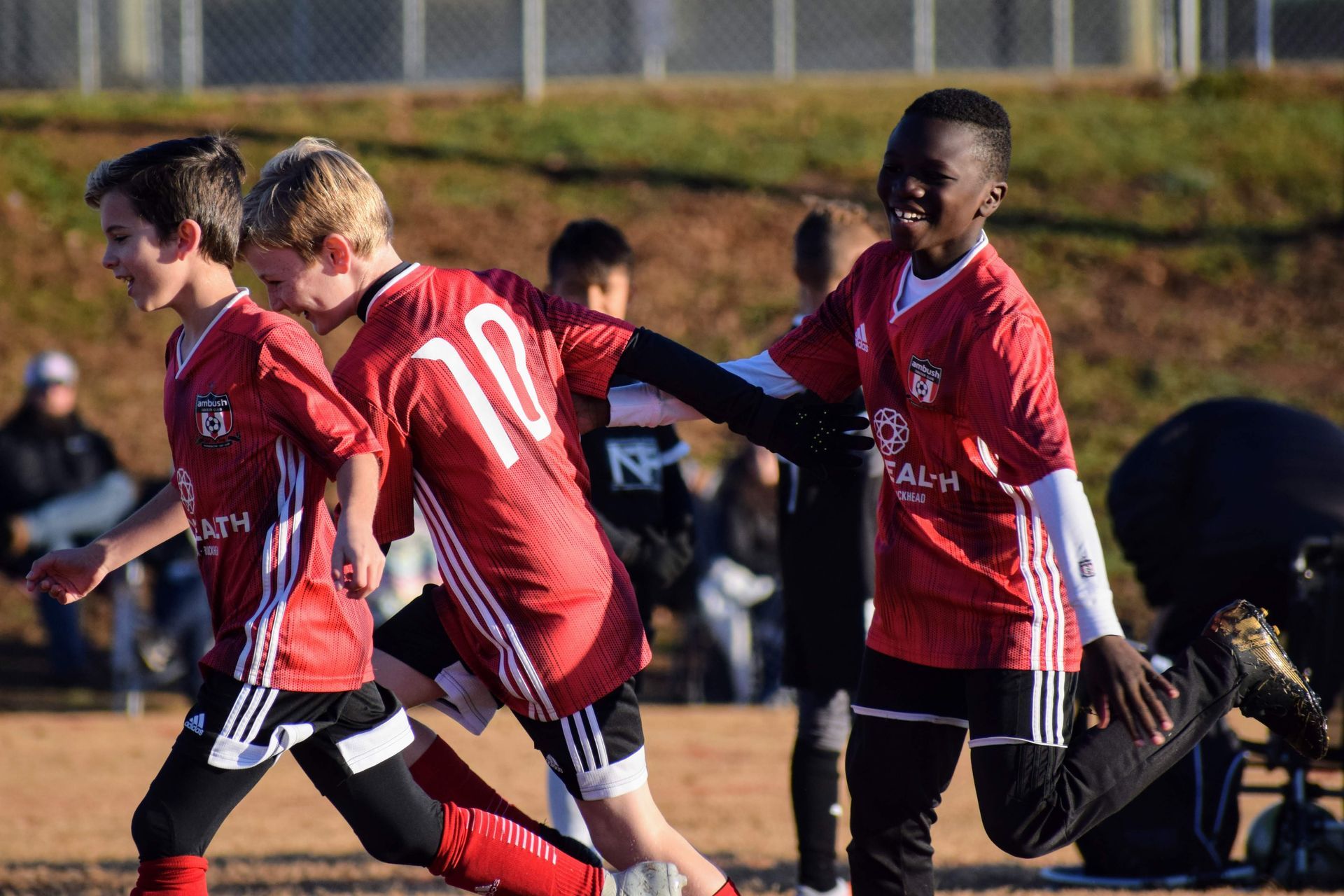 Young boys playing soccer for Concorde Fire Alpharetta