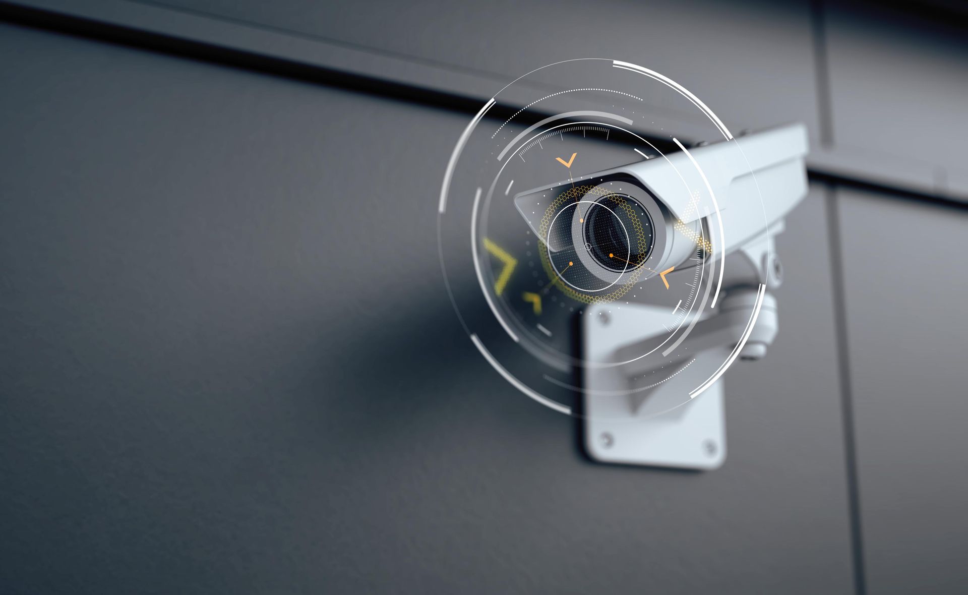 A security camera is mounted on the side of a building.