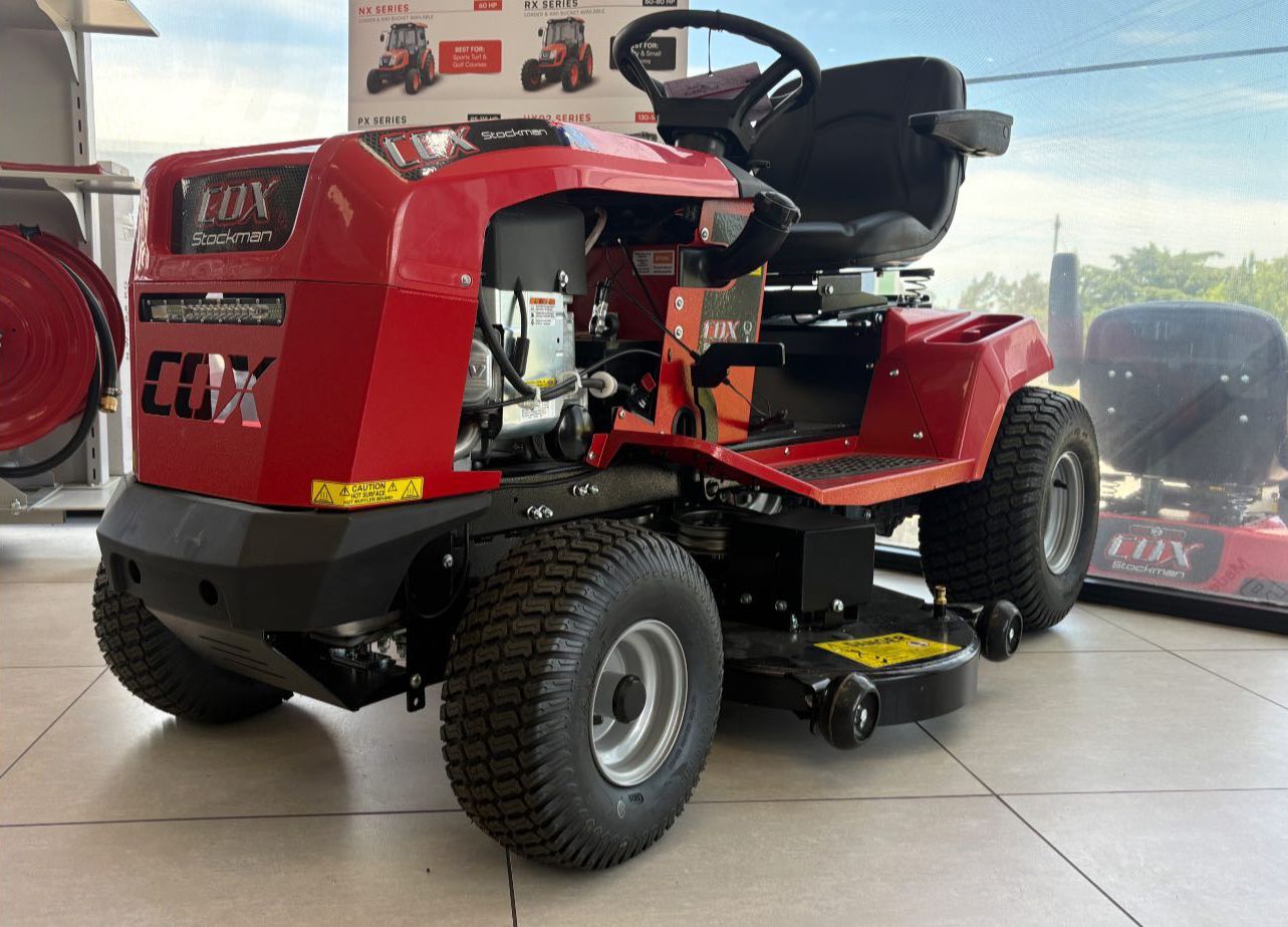 New ride-on lawn tractors for sale at a farm machinery centre New ride-on lawn tractors for sale at a farm machinery centre