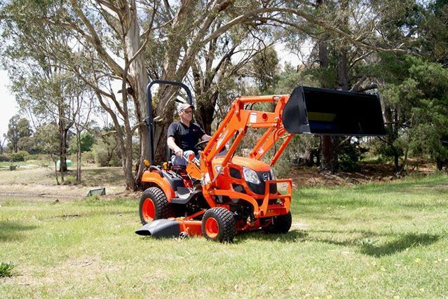 Orange Small Engine Machine with Person | Ararat, Vic | Ararat Auto & Ag Services