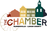 Barnesville-Lamar County Chamber logo with stylized buildings in rust, gold, and green