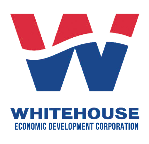 The logo for the whitehouse economic development corporation