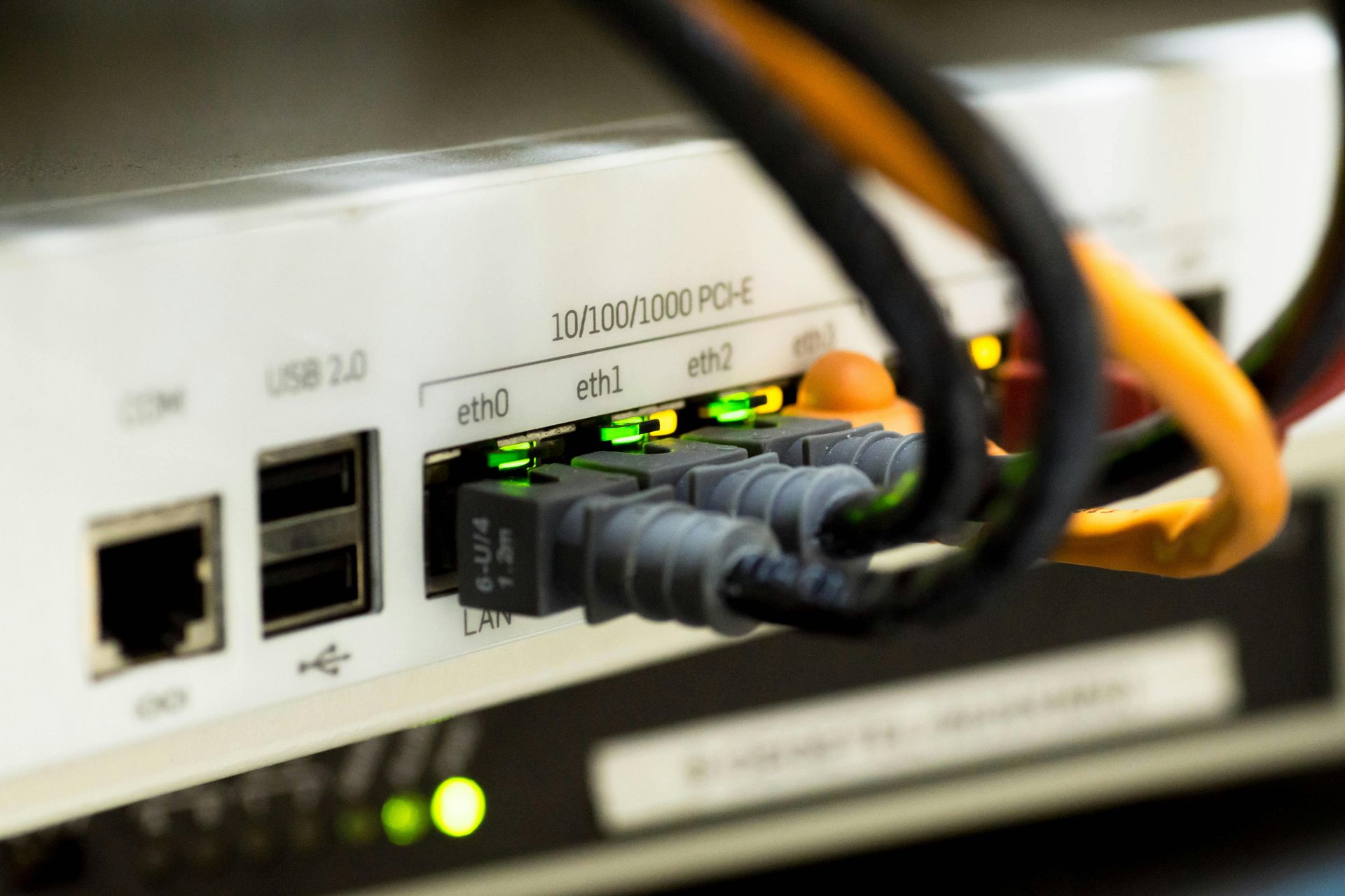 Cables Plugged Into A Server — Professional Electrical & Data Pty Ltd in Bonner, ACT