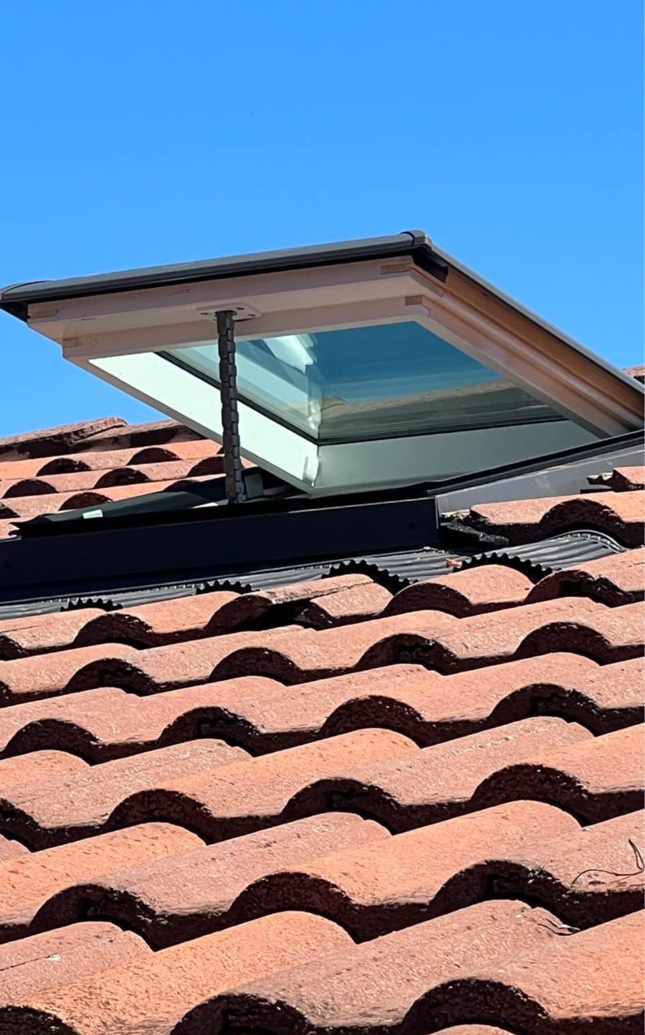 A Skylight is Open on the Roof of a House — CBR Maintenance In Curtin, ATC
