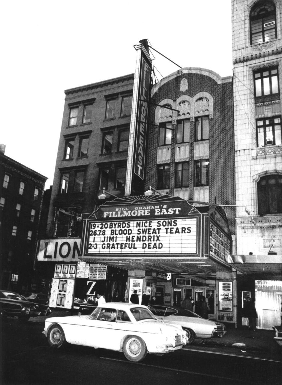 A black and white photo of the lion theater