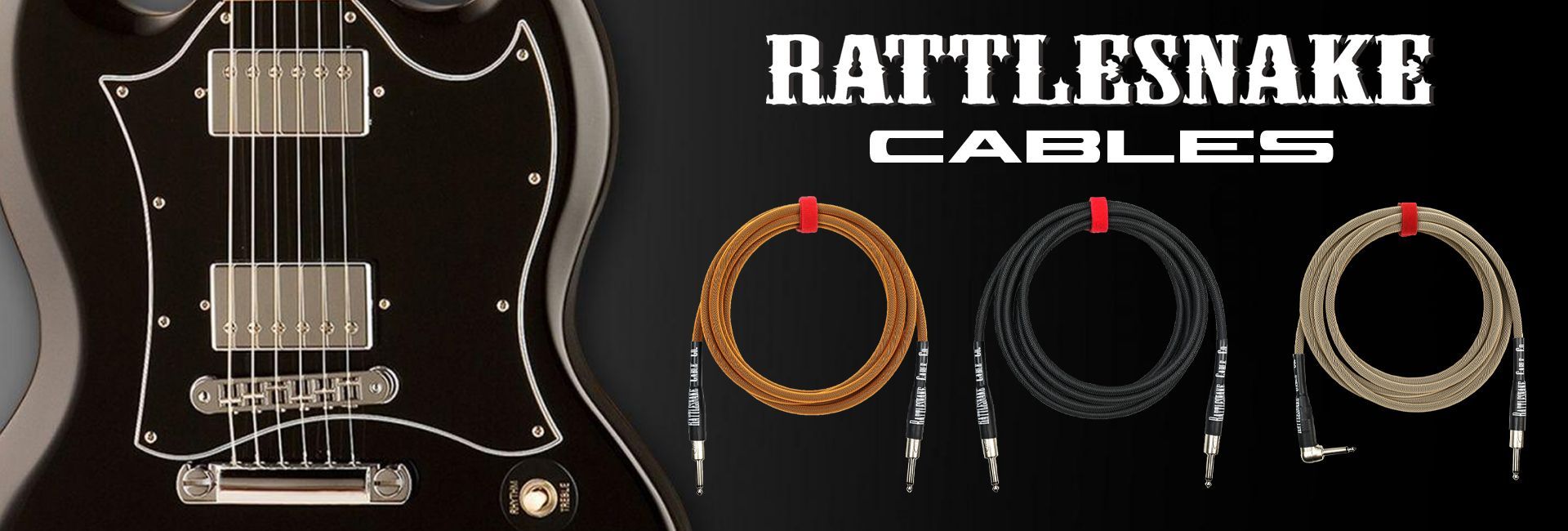 Black guitar next to cables, Rattlesnake Cables ad.